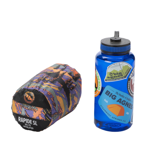 Blue water bottle with Big Agnes logo and colorful sleeping bag on a white background