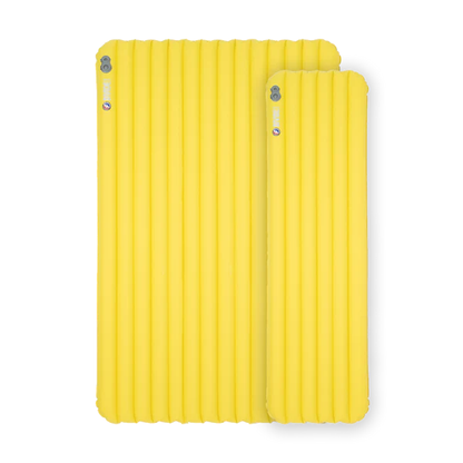 two yellow sleeping pads, one wide, one narrow
