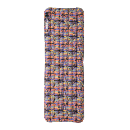 Multicolored inflatable sleeping pad on a white background