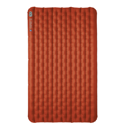 Red camping mattress on a white background